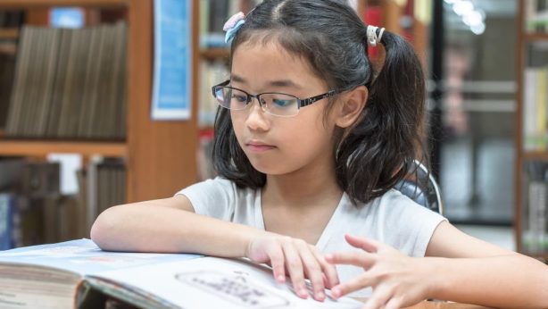 Primary girl studying